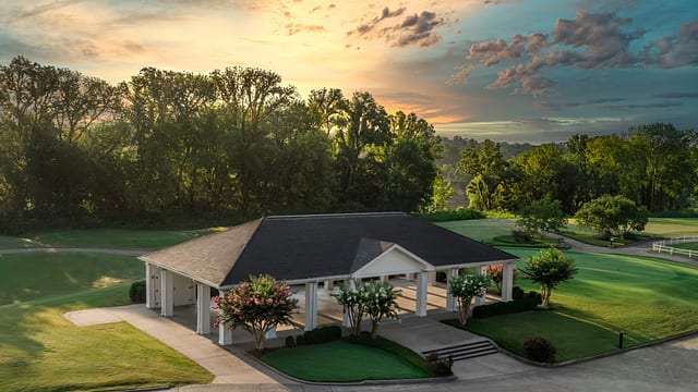 Gaylord Springs Golf Links clubhouse at sunrise