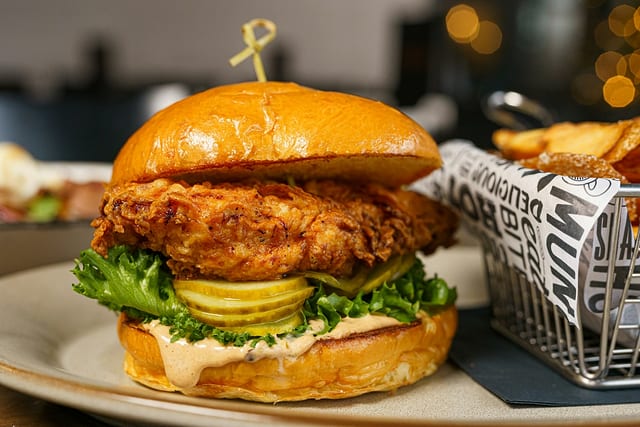 A Nashville hot chicken sandwich with pickles