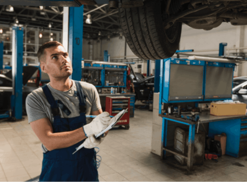 Technician working in a modern repair facility